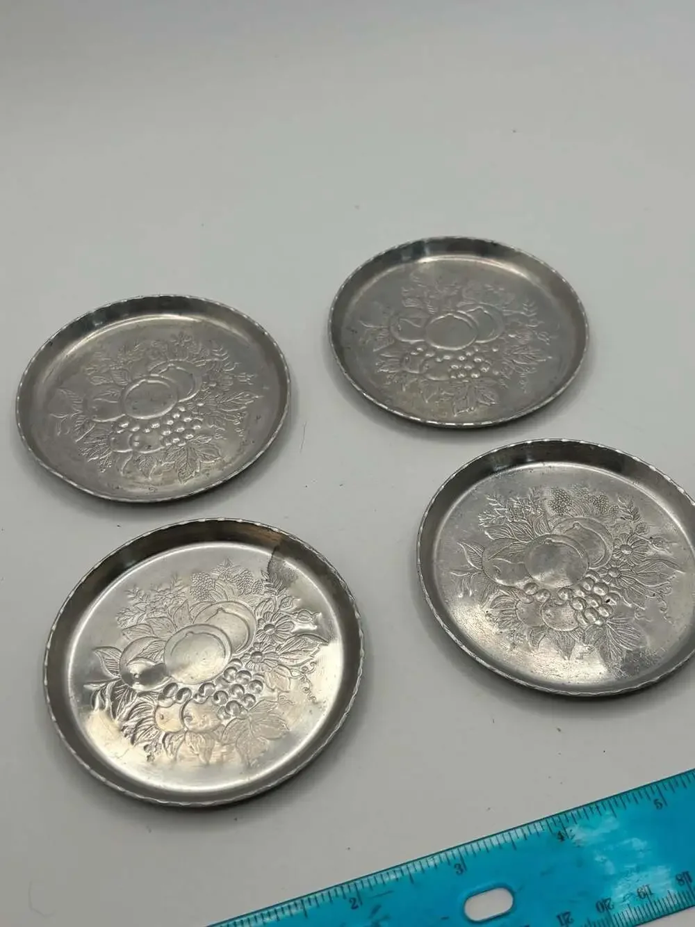 Set of 4 Vintage Embossed Aluminum Fruit Motif Coasters